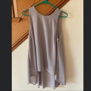 Aryeh brand high-low top. Size small.